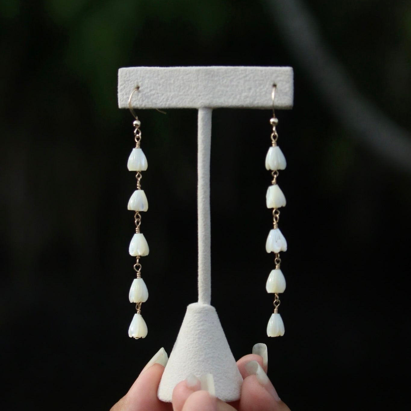 five small mother of pearl pikake dangle